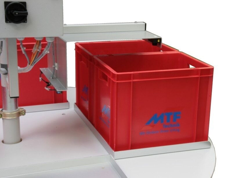 Pick-up system in special design with buttons and sensors for a reliable buffering of filled bags in containers